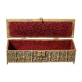 A brass casket showing saints, circa 1900