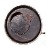 A German brass steering wheel-shaped cigar cutter, circa 1900