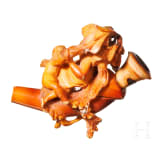 A carved meerschaum pipe with case