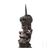 A Congolese Nkisi magic figure and a large Kifwebe mask of the Songye