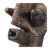 A Congolese Nkisi magic figure and a large Kifwebe mask of the Songye