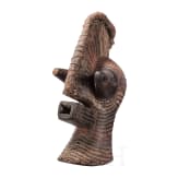 A Congolese Nkisi magic figure and a large Kifwebe mask of the Songye