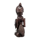 A Congolese cihongo mask of the Chokwe and a small Songye "fetish figure"