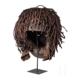 A Congolese cihongo mask of the Chokwe and a small Songye "fetish figure"