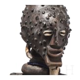 A Congolese cihongo mask of the Chokwe and a small Songye "fetish figure"