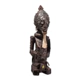 A Congolese cihongo mask of the Chokwe and a small Songye "fetish figure"