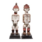 A pair of Gabonese/Congolese standing Kota (Mbete) reliquary figures