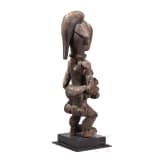 A Gabonese female figure of the Punu and a relic shrine of the Fang, 20th century
