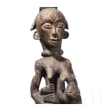 A Gabonese female figure of the Punu and a relic shrine of the Fang, 20th century