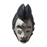 An Okuyi mask of the Punu in Gabon, 20th century