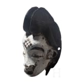 An Okuyi mask of the Punu in Gabon, 20th century