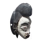 An Okuyi mask of the Punu in Gabon, 20th century