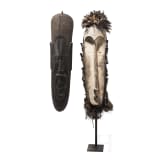 A Gabonese Fang mask and a Kenyan Maasai mask