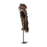 A Gabonese Fang mask and a Kenyan Maasai mask