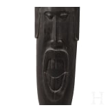 A Gabonese Fang mask and a Kenyan Maasai mask