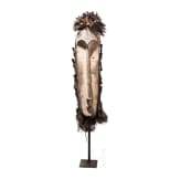 A Gabonese Fang mask and a Kenyan Maasai mask
