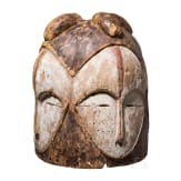A Gabonese four-faced helmet mask (ngontang) of the Fang people, 20th century