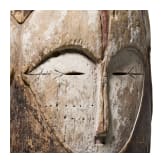 A Gabonese four-faced helmet mask (ngontang) of the Fang people, 20th century