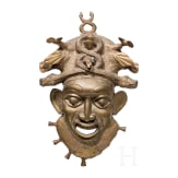 A heavy Cameroonian brass mask of the Bamum/Bamileke