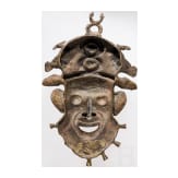 A heavy Cameroonian brass mask of the Bamum/Bamileke