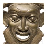 A heavy Cameroonian brass mask of the Bamum/Bamileke