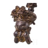 A pair of Cameroonian Bamum pipe-shaped bronzes