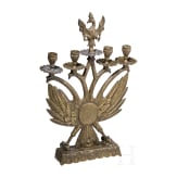 A four-light brass candelabra with double eagle, circa 1900