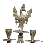 A four-light brass candelabra with double eagle, circa 1900