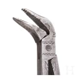 A pair of German engraved iron dental tongs, circa 1800