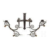 Three wrought iron lamps, probably German, early 20th century