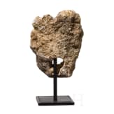 A small French Romanesque gargoyle, 12th century