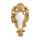 A mirror in a carved frame, probably German, 19th century