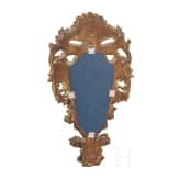 A mirror in a carved frame, probably German, 19th century