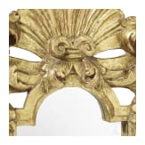 A mirror in a carved frame, probably German, 19th century
