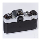 A Zeiss Ikon SL 706 with Carl Zeiss Tessar 50 mm, a Skoparex 35 mm, a Super-Dynarex 135 mm