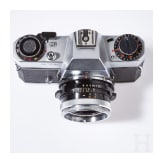 A Zeiss Ikon SL 706 with Carl Zeiss Tessar 50 mm, a Skoparex 35 mm, a Super-Dynarex 135 mm