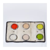 A group of filters and lens hoods from Rollei, Heliopan, Zeiss Ikolor