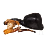 A carved Russian figural meerschaum pipe, St. Petersburg, late 19th century