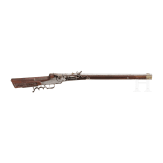 A wheellock rifle, collector's replica in 17th century style using some old parts