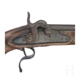 A percussion pistol and a powder flask, circa 1800