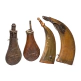 Four powder flasks, 19th and 20th century