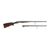 A side by side combination gun with extra side by side shotgun barrel in case