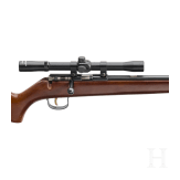A single shot rifle Voere with scope Tasco