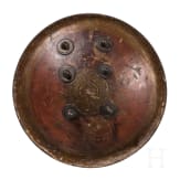 A painted Indian leather shield, circa 1800
