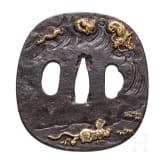 A Japanese Mito school tsuba with dragon and tiger, Edo period