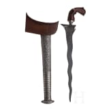 An Indonesian Sulawesi keris with embossed silver scabbard, 20th century