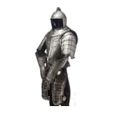 A suit of black and white cavalry armour, assembled from old components, Nuremberg, circa 1560 - 1600