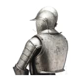 A suit of black and white cavalry armour, assembled from old components, Nuremberg, circa 1560 - 1600