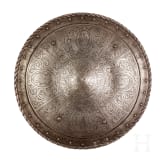 An etched round shield, collector's replica in the style of the 16th century