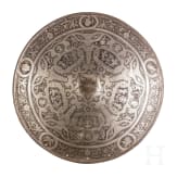 A heavy etched round shield, collector's replica in the style of the 16th century
